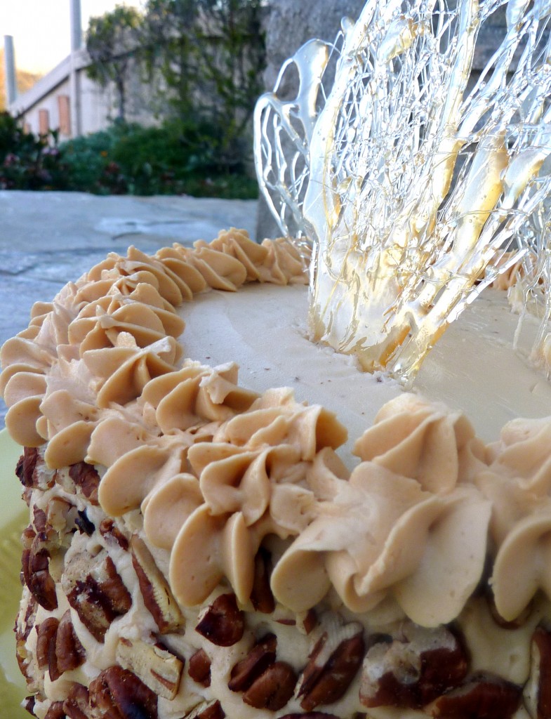 This Apple Spice Layer Cake with Caramel Buttercream is a moist three layer cake with a caramel buttercream and caramelized sugar decorations!