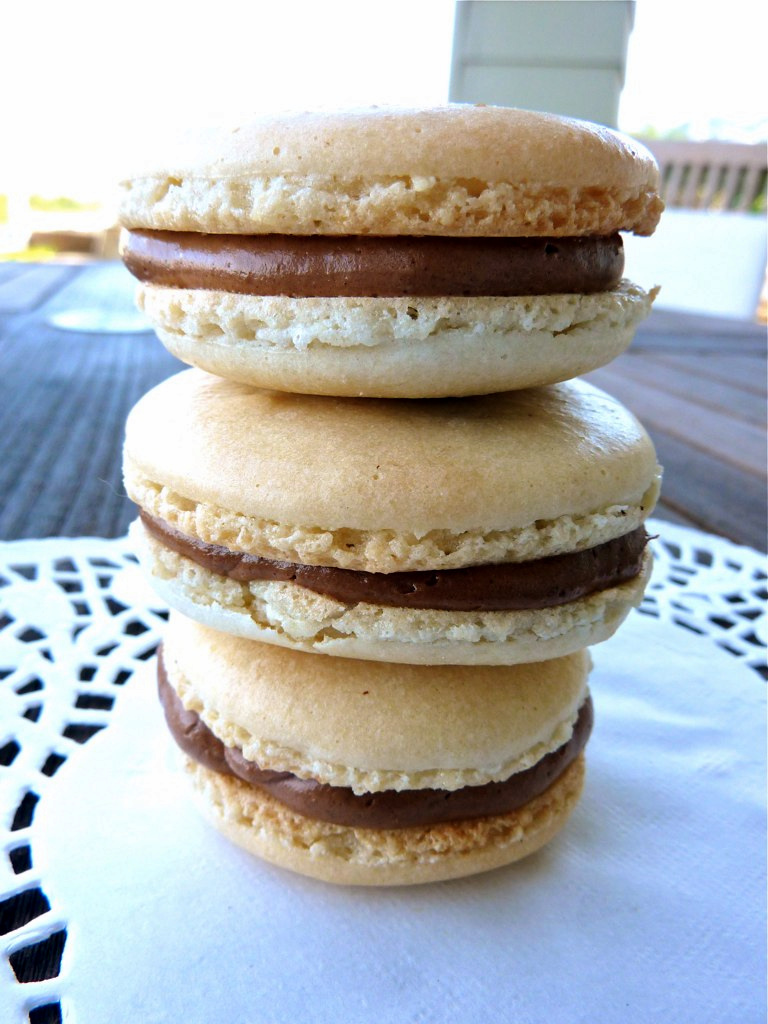 A recipe for Vanilla French Macarons with French Chocolate Buttercream. See my tips & the recipe for a delicious, creamy, rich French chocolate buttercream!