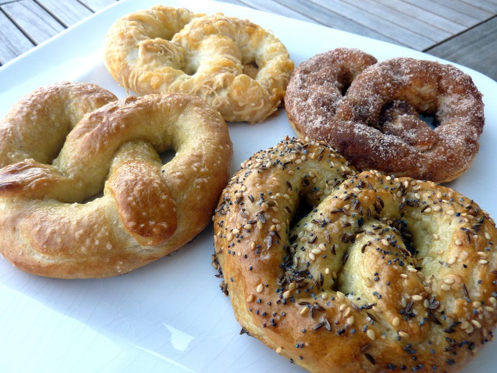 These Homemade Soft Pretzels were made four different ways: salted, cheesy, everything, and coated in cinnamon sugar! This post includes a how-to with step by step photos.