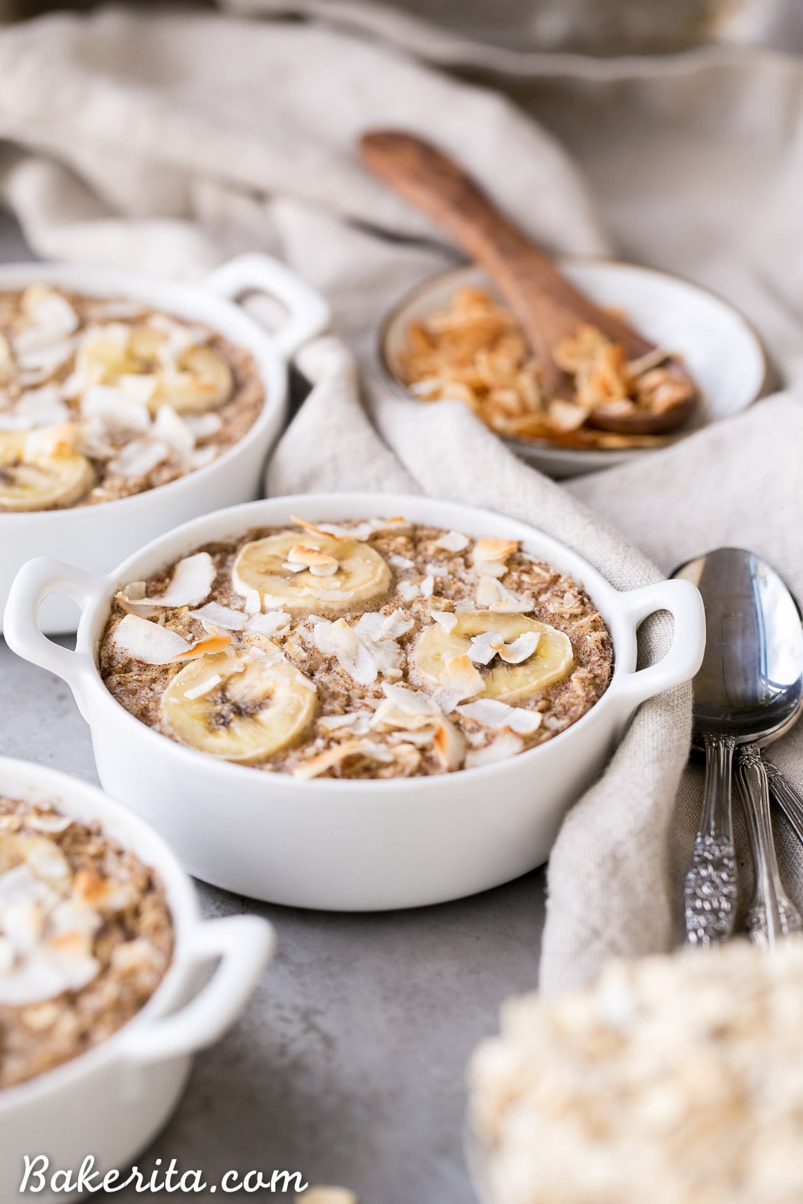 This Banana Coconut Baked Oatmeal is packed with fiber and potassium for a healthy, hearty breakfast. This easy recipe is vegan, gluten-free, and sweetened with a ripe banana - no added sugar needed!