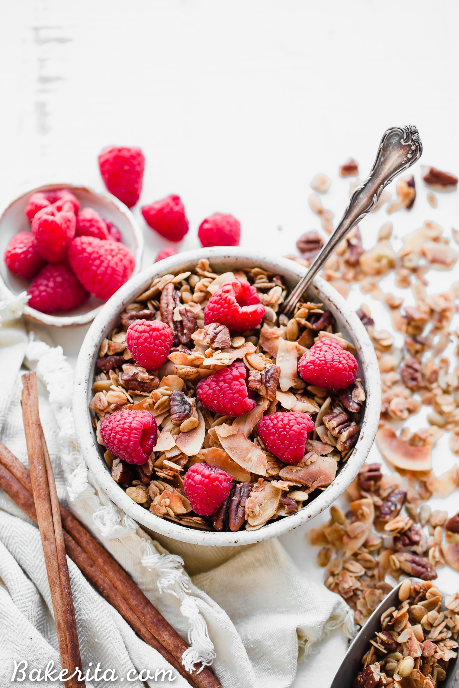 This Coconut Pecan Granola is a flavorful, crunchy, and just lightly sweetened with maple syrup. This gluten-free, refined sugar-free, and vegan granola is perfect for stirring into your yogurt, serving with milk or eating on its own as a snack.