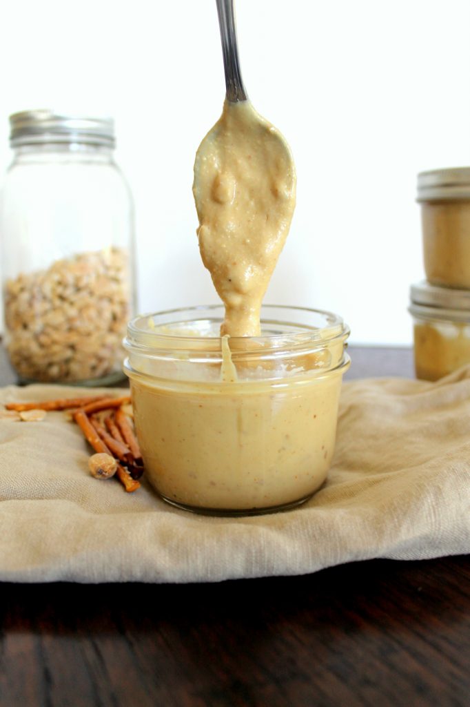 This creamy White Chocolate Pretzel Peanut Butter is creamy and crunchy from the salty pretzel pieces. This is the perfect combination of salty and sweet!