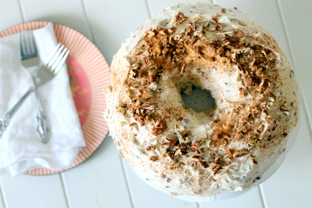 This moist, easy Carrot Cake with Pecan Cream Cheese Frosting comes together quickly and is topped with a super creamy, pecan-studded cream cheese frosting!