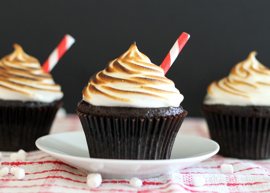 These Hot Chocolate Cupcakes are topped with a fluffy, toasted marshmallow frosting! You'll love these decadent cupcakes that taste just like hot chocolate.