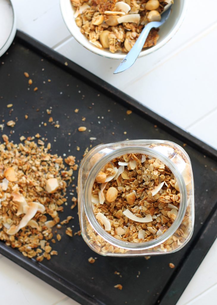 This Coconut Macadamia Nut Granola is the perfect breakfast or snack. Paired with yogurt and berries, this is my favorite breakfast! This easy recipe is gluten free, vegan, and refined sugar free.