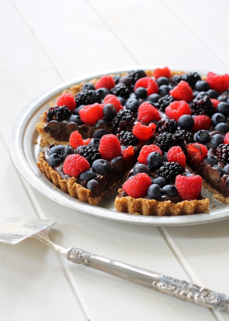 This Chocolate Berry Tart has vegan chocolate ganache in an almond flour crust, topped with berries! It is Paleo, gluten-free, vegan and refined sugar-free.