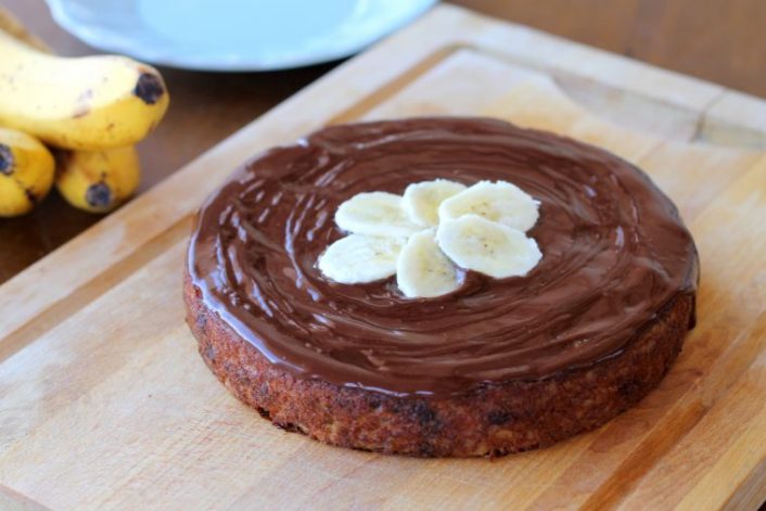 This single layer Paleo Banana Cake is topped with a silky chocolate ganache making it so simple and even more delicious! This dessert is gluten-free, refined sugar-free, and healthy enough to be breakfast! #bananacake #paleocake #paloe #glutenfree #paleodessert