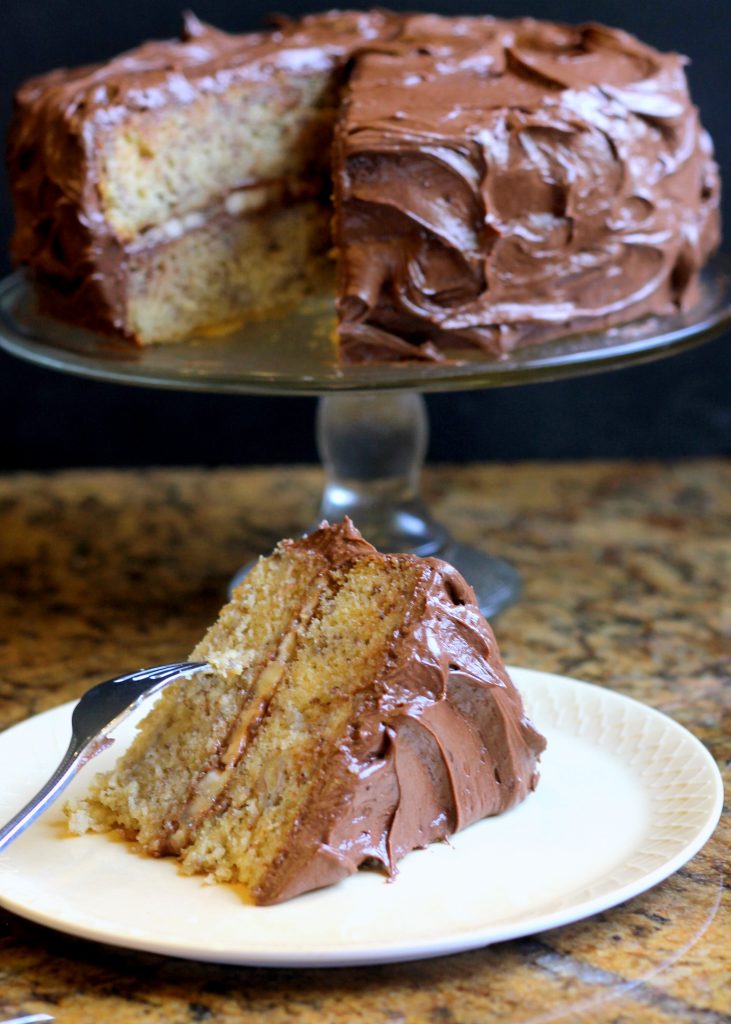 This recipe for Banana Layer Cake with Chocolate Cream Cheese Frosting makes one of the moistest banana cakes around - definitely not to be confused with banana bread. The chocolate cream cheese frosting makes it even more decadent!