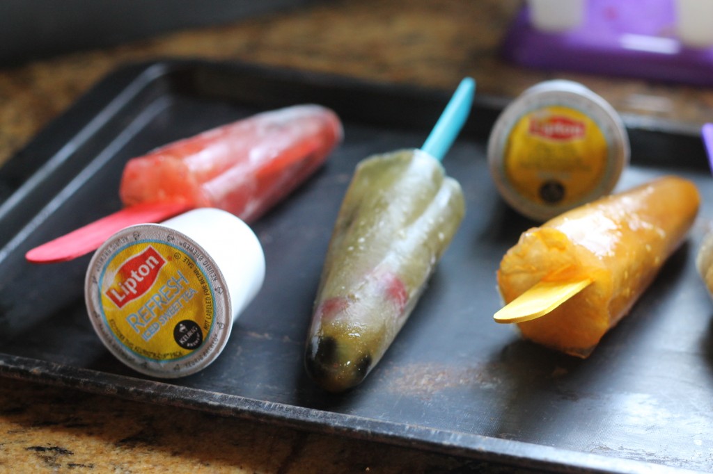 These Iced Tea Popsicles are made in minutes with Lipton Iced Tea K-Cups, and are easily customized to your favorite flavors!