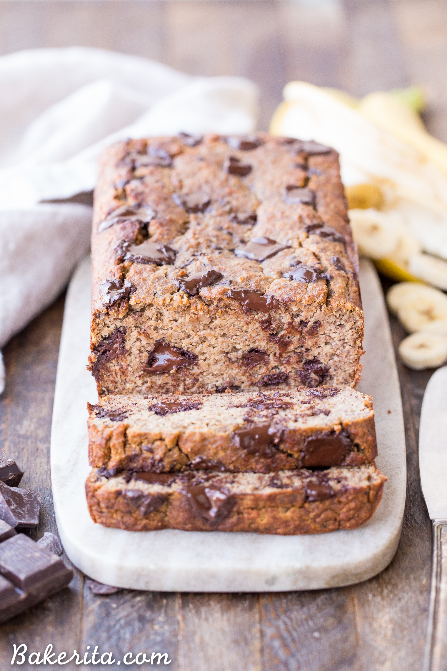This Paleo Chocolate Chunk Banana Bread is sweetened only with bananas for a guiltless treat that tastes just like traditional banana bread! This is easy recipe you'll come back to again and again. This paleo banana bread is also gluten-free, grain free, and sugar-free.