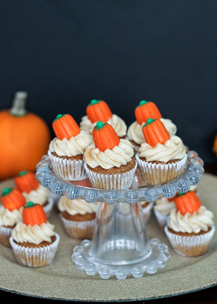 These Pumpkin Carrot Cupcakes with Cinnamon Cream Cheese Frosting are a sweet fall flavored twist on your favorite veggie cake! They're super moist and tender thanks to the pumpkin and carrot, and the cinnamon makes the cream cheese frosting taste even more delicious.