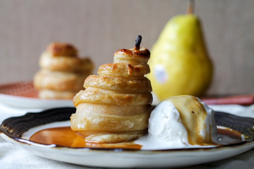 These Apple Cider Poached Pears in Cinnamon Sugar Puff Pastry are easier than you'd think, and use poaching liquid to make a caramel sauce!