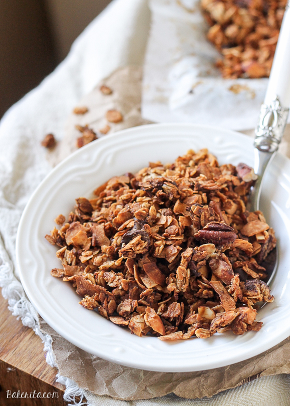 This Banana Coconut Granola tastes warm and tropical, and is full of crunch from the coconut flakes and pecans! It makes the perfect snack by itself, or mix it into some yogurt for the perfect breakfast.
