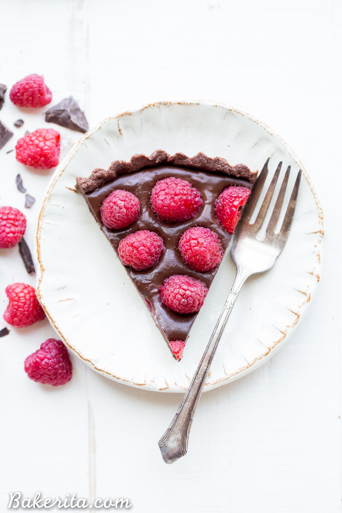This No-Bake Raspberry Chocolate Tart comes together in just ten minutes! The no-bake chocolate crust is filled with vegan chocolate ganache and topped with fresh raspberries for a decadent, guilt-free treat.
