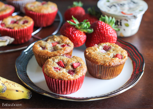 These Strawberry Banana Muffins are the perfect on-the-go snack or breakfast! Greek yogurt and bananas keep these muffins super moist, and strawberries make them fruity and super flavorful.