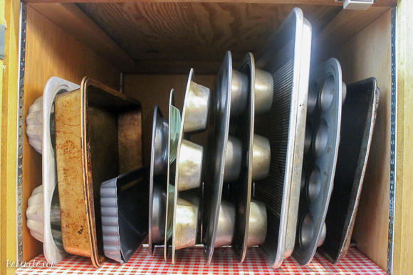 This is how I organize my pans, using a Euro Kitchen Organizer.
