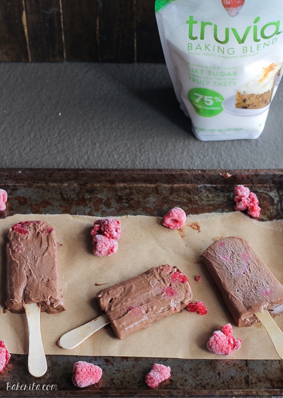 These Chocolate Raspberry Popsicles are a refreshing frozen chocolate treat to enjoy on a hot day. These pops, filled with raspberries, are also vegan!