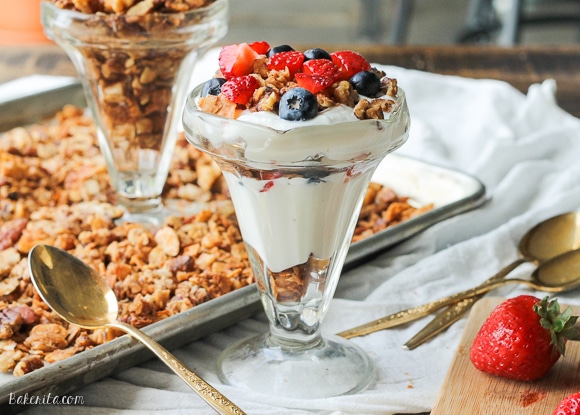 This Paleo Granola uses nuts and coconut to bulk it up and add a ton of protein, while egg whites help keep the granola clumpy and crunchy! It is gluten-free, refined sugar-free, and dairy-free.