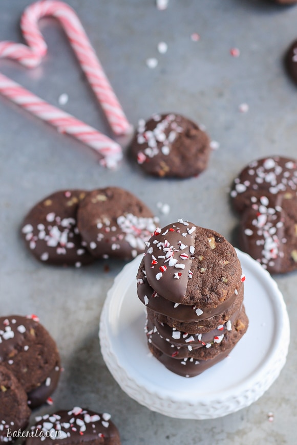 Chocolate Mint Shortbread Cookies are easy to make slice n' bake cookies that are perfect for gifting! These crunchy chocolate cookies have a minty chocolate coating and sprinkle of crushed candy canes.