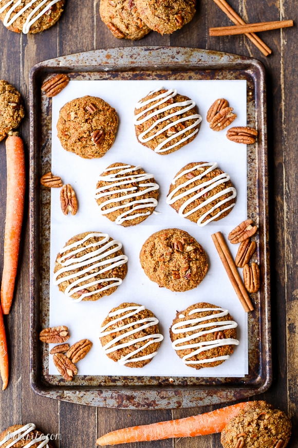 These Carrot Cake Cookies are drizzled with cream cheese glaze and taste just like carrot cake! The cookies are gluten-free, grain-free, and refined sugar-free.