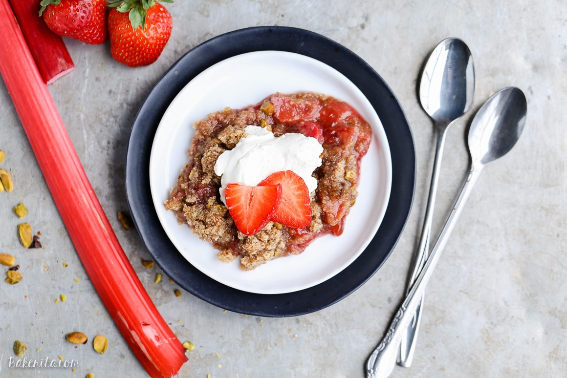 This Strawberry Rhubarb Crisp combines tart rhubarb and sweet strawberries, topped with a pistachio crumble topping! This crisp is Paleo-friendly, gluten-free, and vegan.