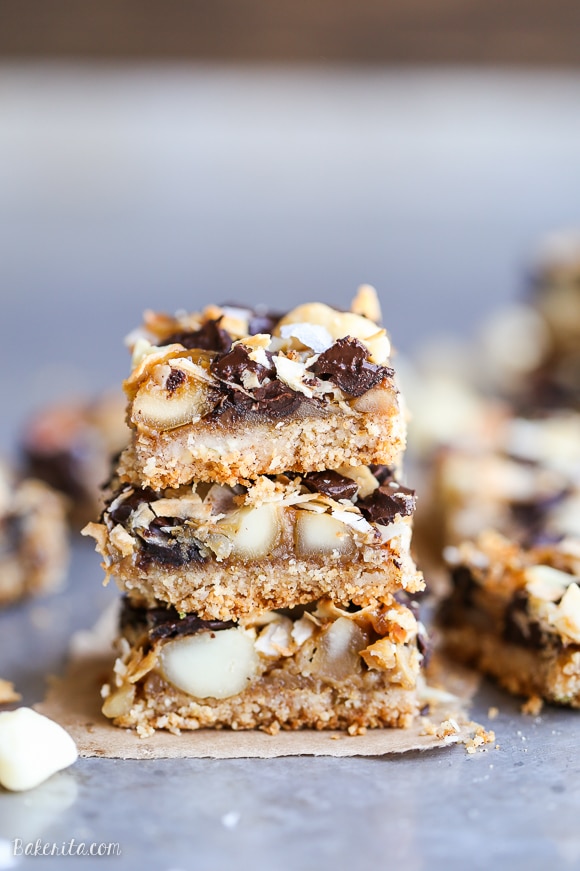 These Dark Chocolate Macadamia Nut Magic Bars are a sweet & gooey dessert bar with a hint of tropical flair. You'll be hooked after one bite of the gooey vegan caramel and buttery macadamia nuts on a gluten-free coconut lime crust.