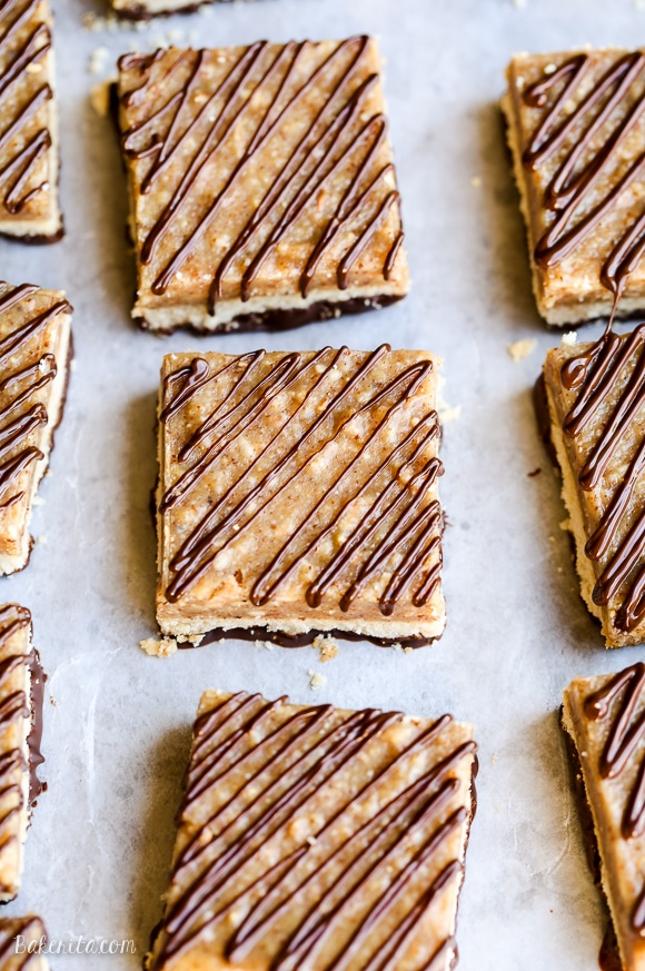 These Samoa Bars have a shortbread crust, a layer of toasted coconut caramel, and a dark chocolate drizzle! They're a gluten-free, Paleo, vegan, and guilt-free way to enjoy your favorite Girl Scout cookie.