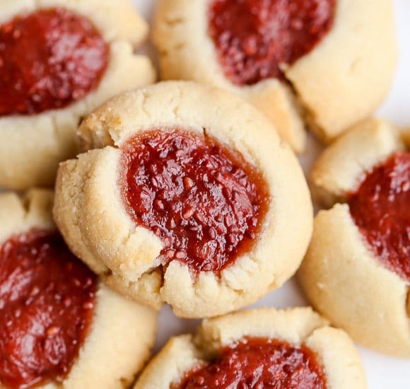 These Jam Thumbprint Cookies are a simple and delicious cookie made with only four ingredients! You won't be able to have just one of these gluten-free, vegan, and Paleo-friendly cookies.