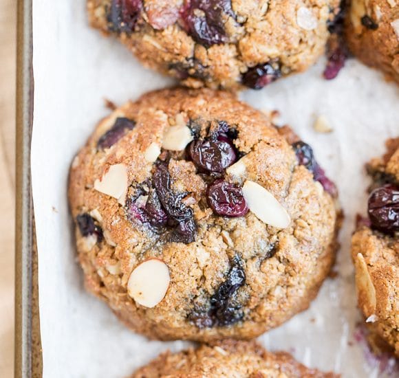 Almond Blueberry Breakfast Cookies are a quick and healthy breakfast treat, snack, or dessert. These hearty breakfast cookies, made with rolled oats and almond butter, are gluten free, refined sugar free, and bursting with fresh blueberries!