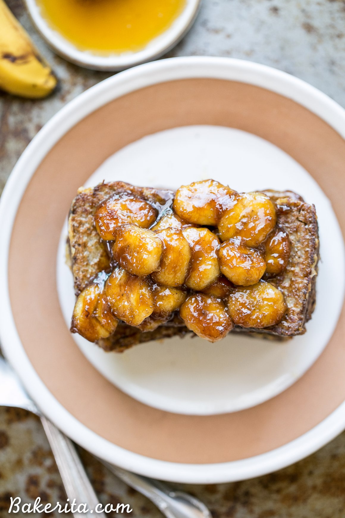 This Banana Bread French Toast is topped with caramelized bananas for a banana lover's delight! This gluten-free, Paleo, and dairy-free french toast is sure to satisfy your breakfast and brunch cravings.