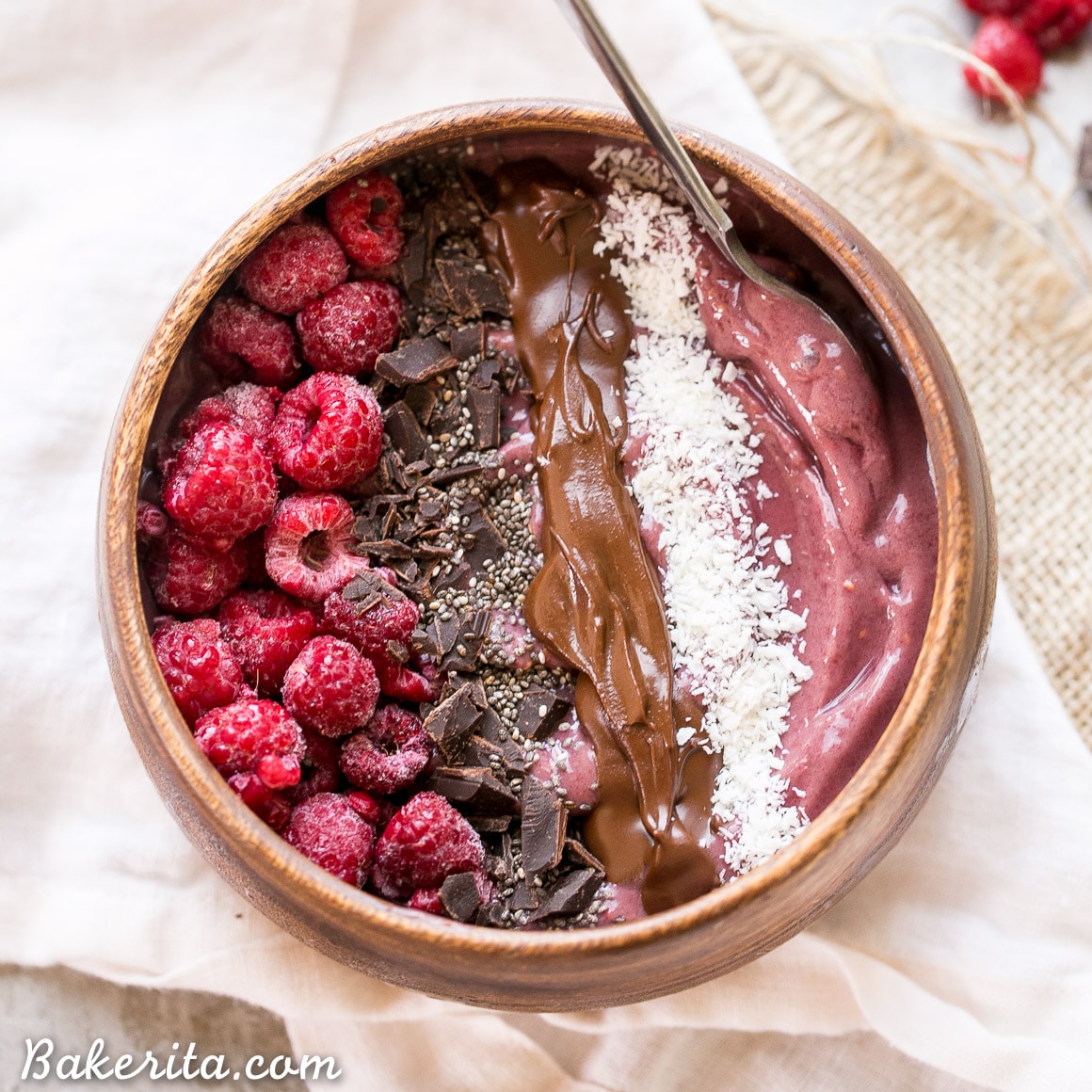 This Raspberry Acai Bowl is a refreshing & delicious breakfast, especially when you add your favorite toppings! This healthy breakfast is ready in a few minutes.
