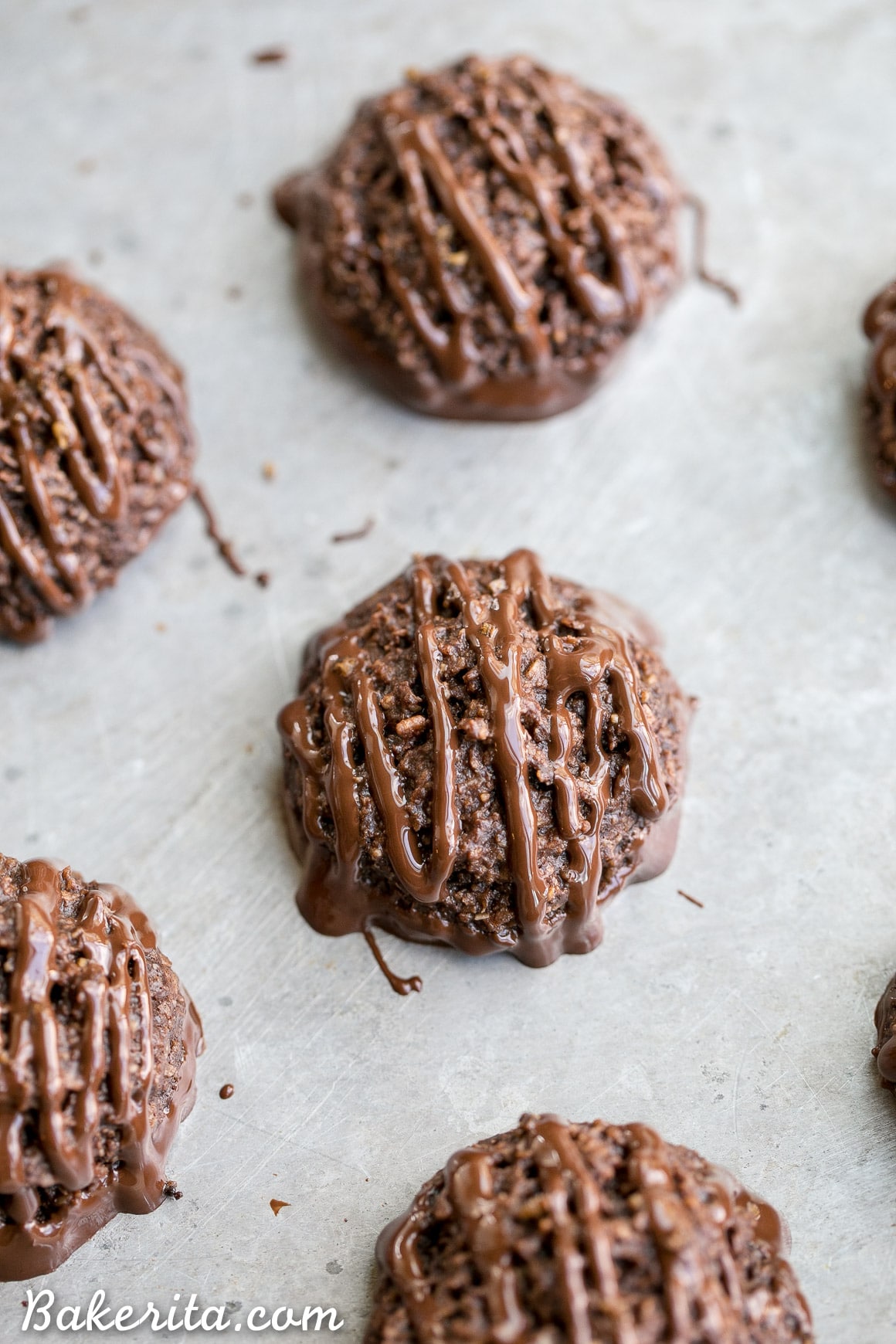 These rich Double Chocolate Macaroons are made super chocolatey with both cocoa powder and melted chocolate. These easy cookies are dipped and drizzled with chocolate, and they're gluten-free, Paleo + vegan.