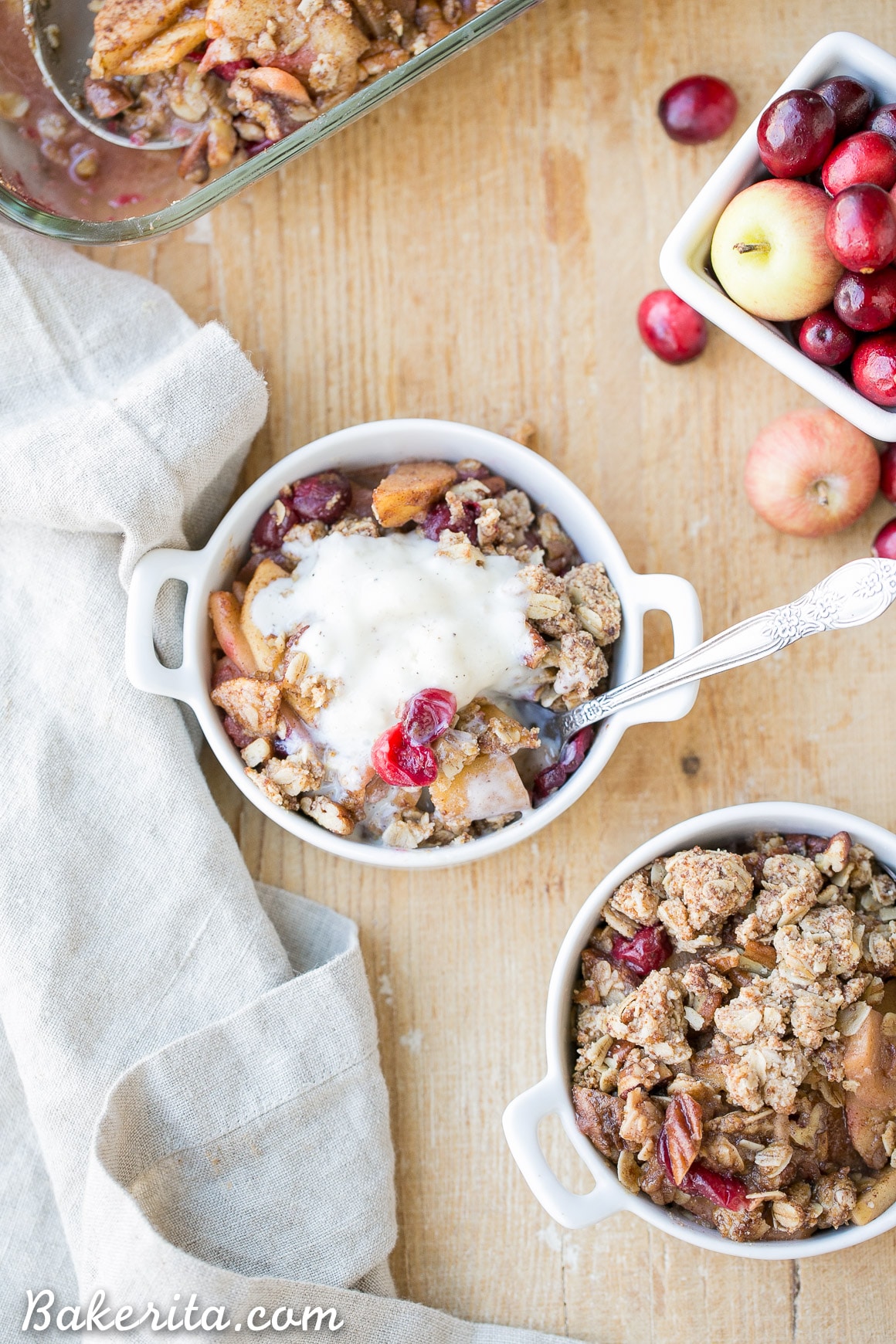 This Cranberry Apple Crisp is spiced with cinnamon, nutmeg & orange zest and topped with a crunchy pecan oatmeal crisp topping. This gluten-free and vegan crisp is the perfect holiday dessert!