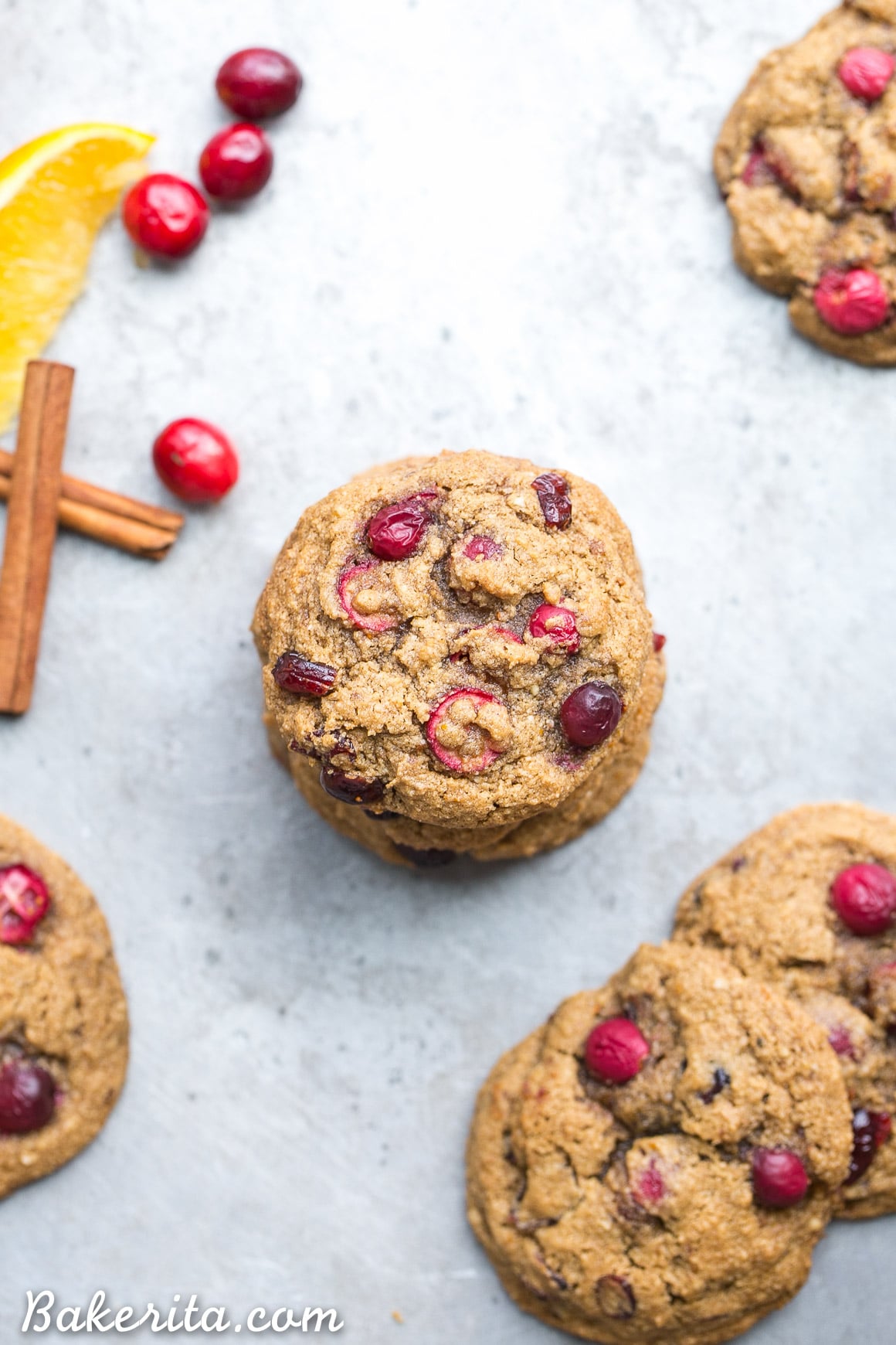 These Gluten-Free Cranberry Orange Cookies are soft, chewy and bursting with flavor! They're loaded with cinnamon, orange zest, fresh tart cranberries, and chewy dried cranberries. Perfect for the holidays!