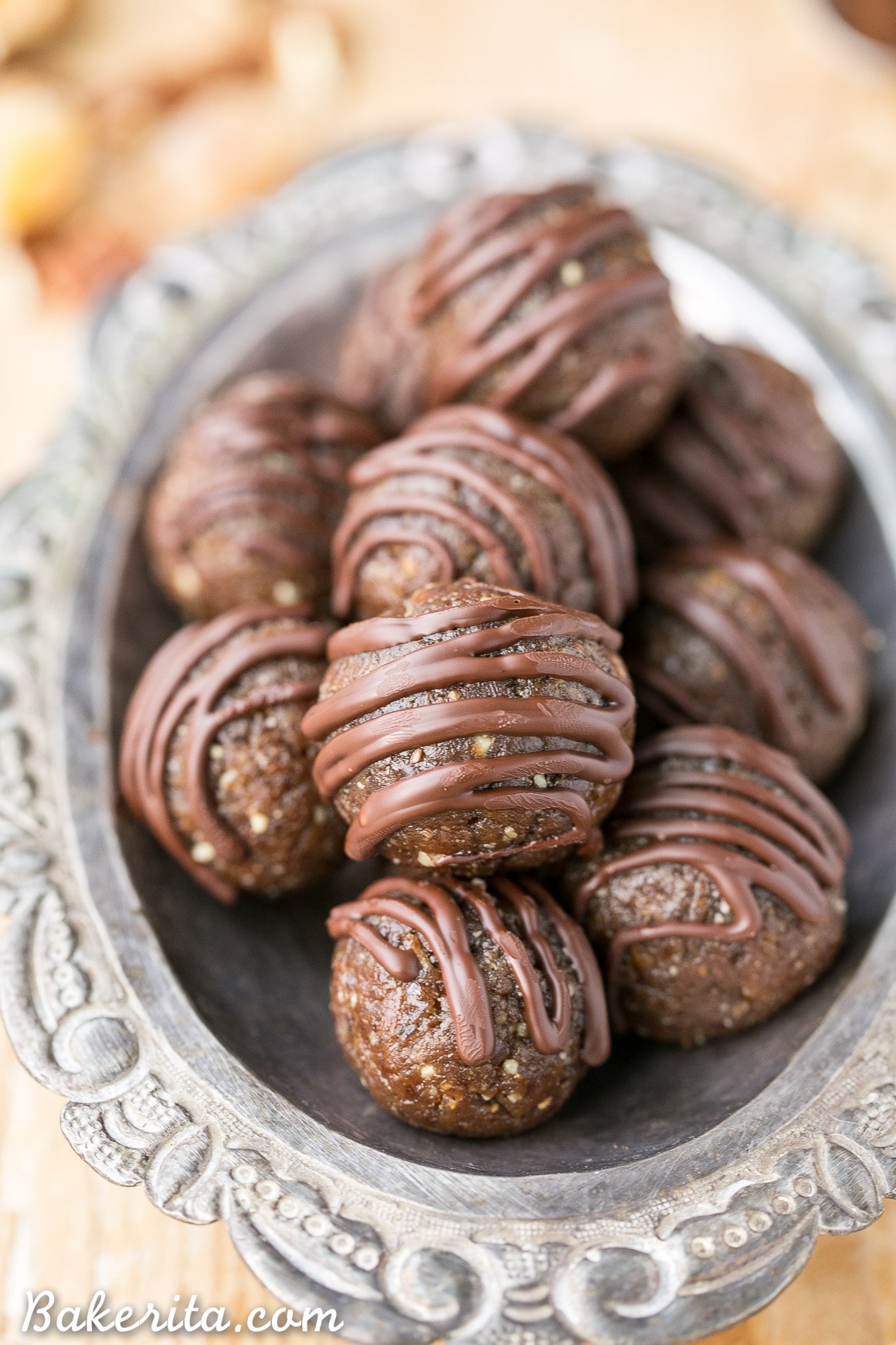 No baking required to make these Gingerbread Energy Bites! These gluten-free, Paleo + vegan energy bites are made with dates, pecans, and gingerbread spices - they're the perfect healthy snack to fuel your day.