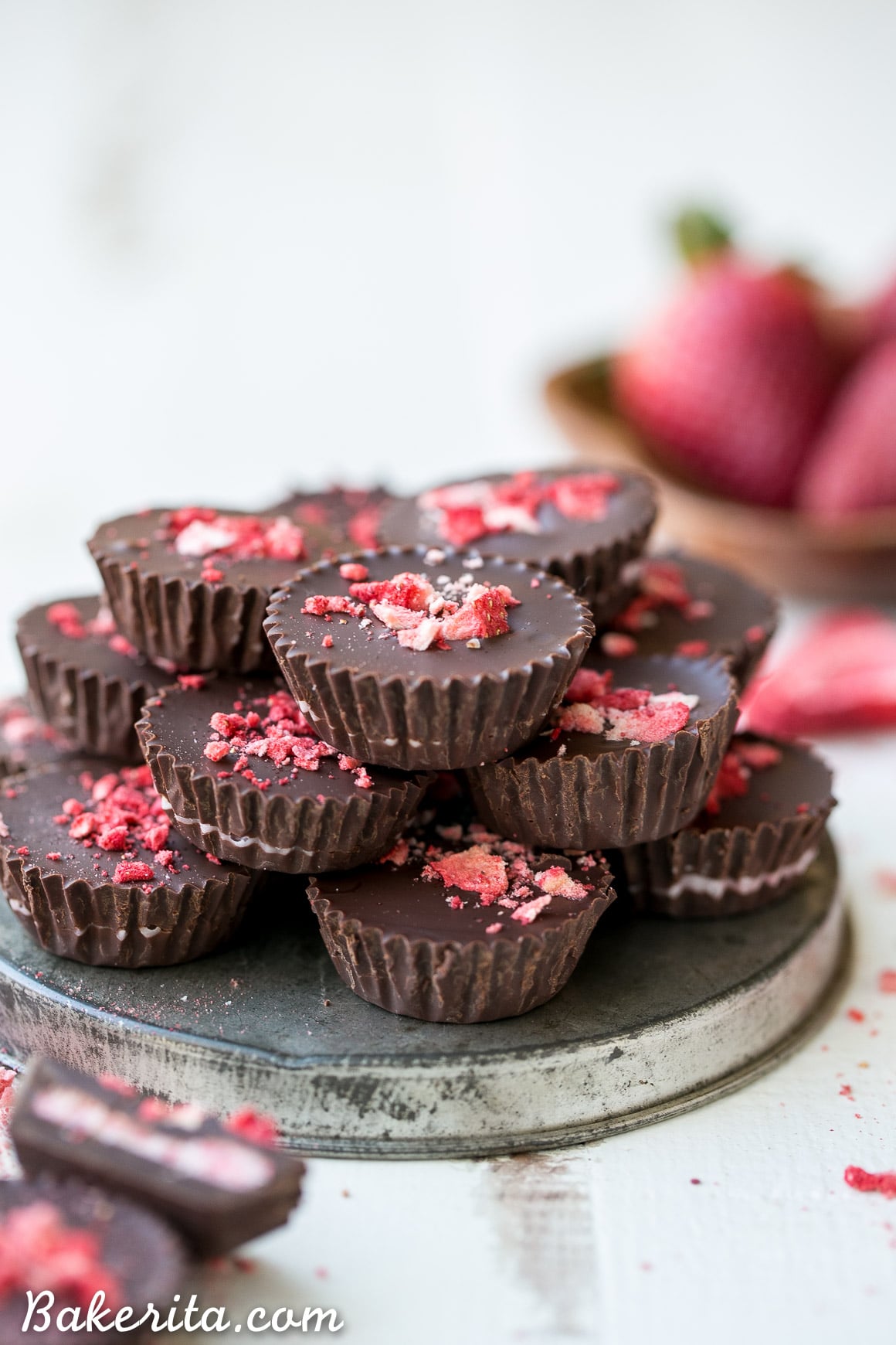 These Chocolate Strawberry Cups have a creamy strawberry + coconut butter filling encased in homemade chocolate! These gluten-free, Paleo + vegan candy cups will satisfy your sweet tooth more healthfully.