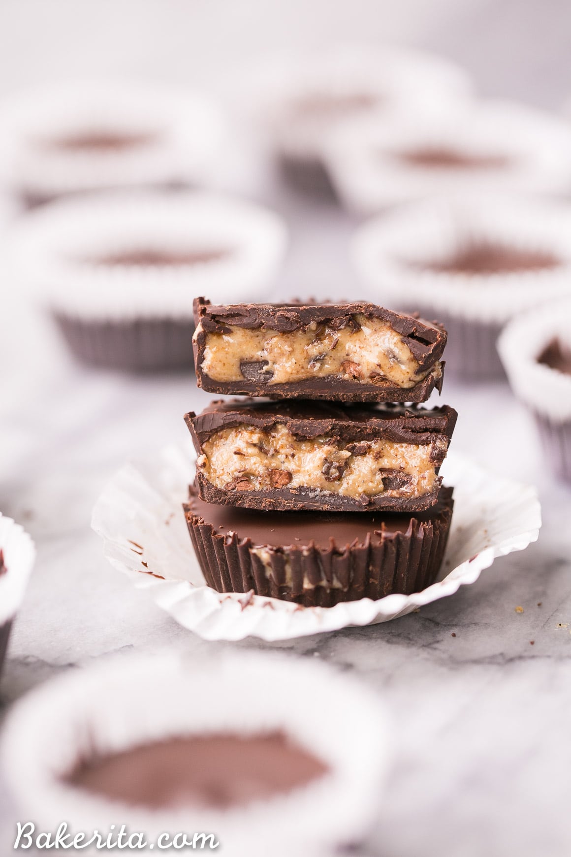 These Chocolate Chip Cookie Dough Cups are an easy way to satisfy your cookie dough craving in a healthy + delicious way! These easy, no-bake cups are gluten-free, Paleo, and vegan.
