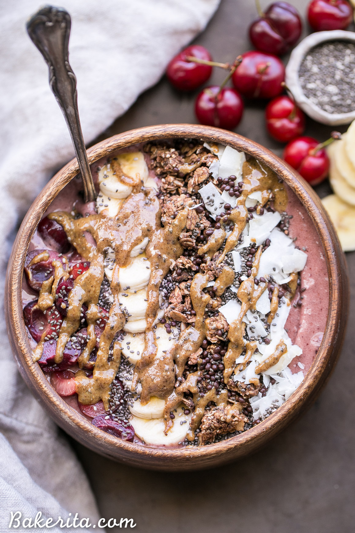 This Banana Cherry Smoothie Bowl is a healthy and delicious breakfast treat! It's refreshing, filling, and loaded with beautifying superfoods. Add all your favorite toppings for a treat suited just to your tastes.