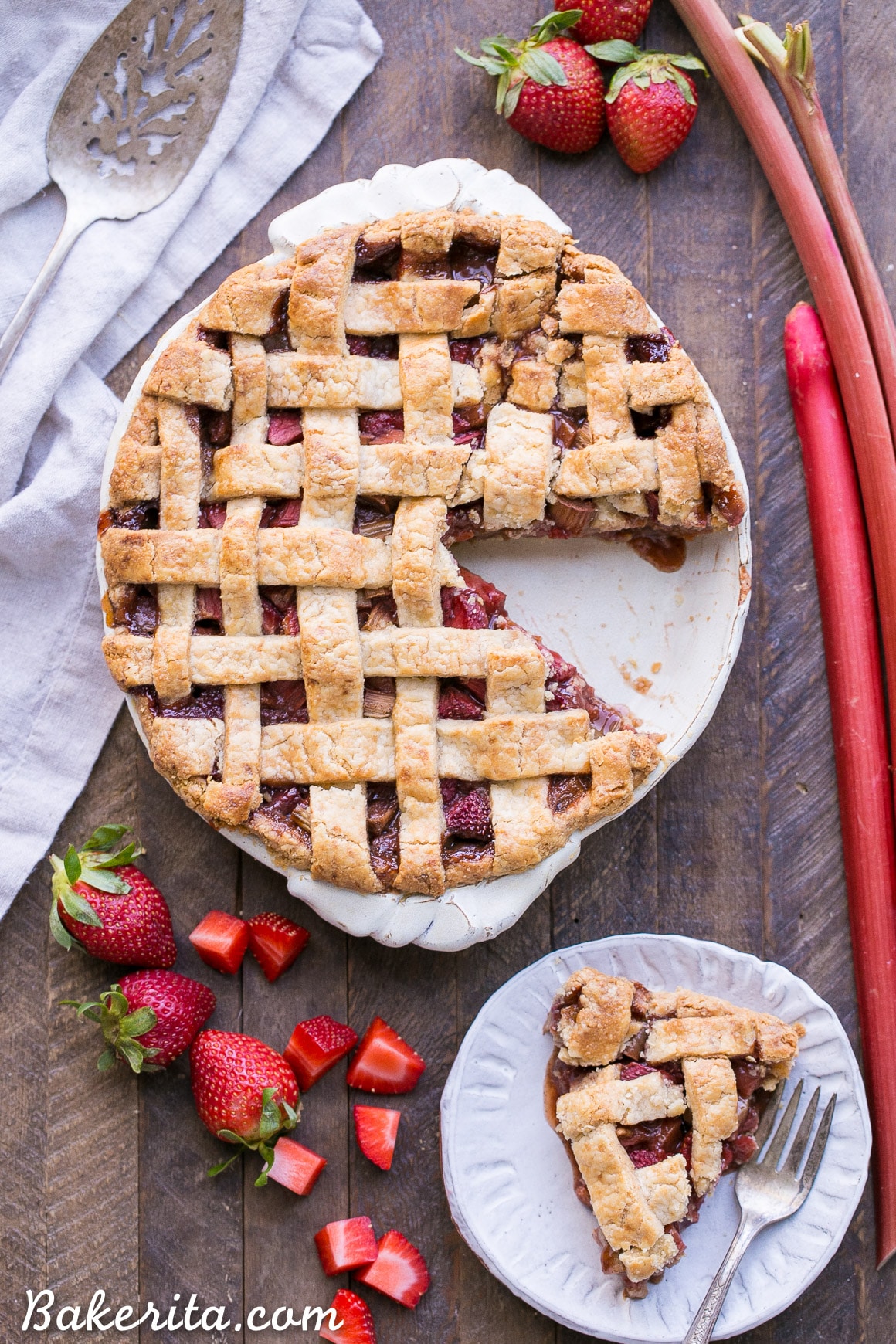 This Paleo Strawberry Rhubarb Pie is bursting with fresh strawberries and rhubarb, creating a delectable tart + sweet pie! The crisp and flaky gluten-free + grain-free crust is the perfect vessel for the lightly spiced fruit filling.