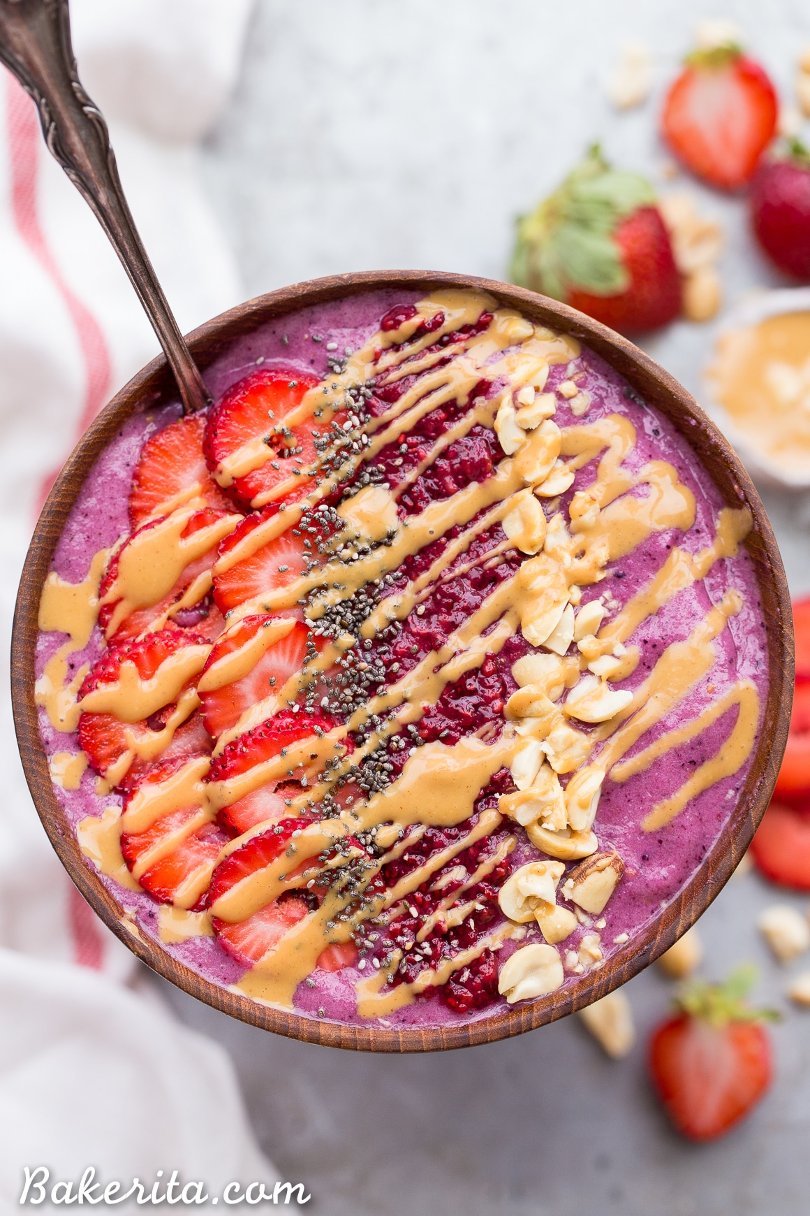 This Peanut Butter & Jelly Smoothie Bowl is smooth, creamy, and delicious - the flavors will bring you right back to your favorite childhood sandwich. This gluten-free and vegan breakfast bowl has a secret vegetable ingredient packed in too - shhh!