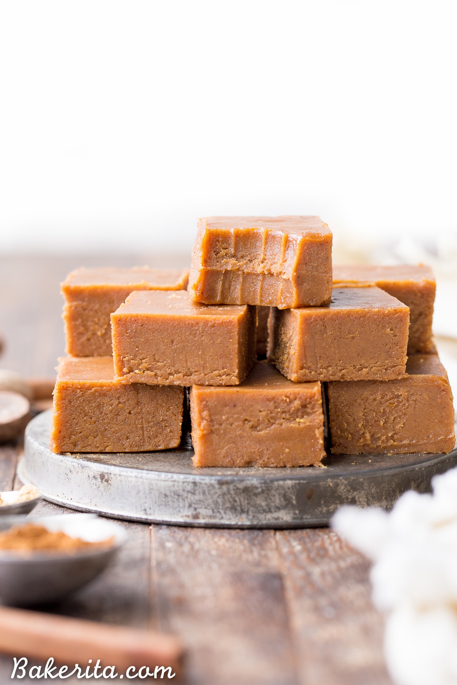 This Raw Vegan Pumpkin Spice Fudge is an easy-to-make, no-cooking-necessary treat that melts in your mouth and tastes like fall! With just five ingredients, this paleo and vegan homemade fudge couldn't be easier to make.