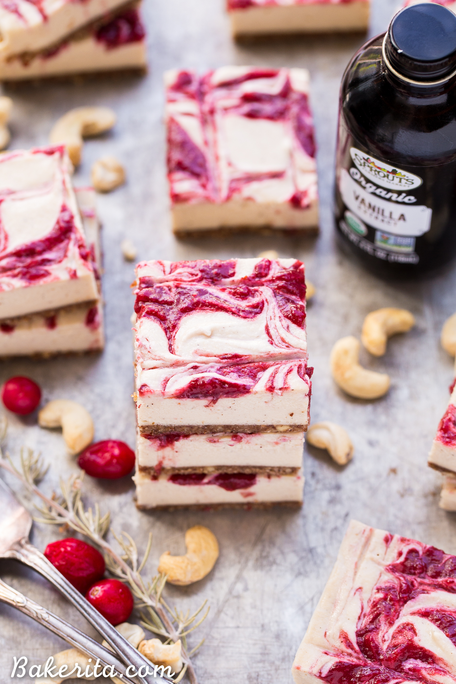 These Vanilla Bean Cranberry Swirl Bars are made with cashews for a smooth and creamy "cheesecake" that's completely paleo, dairy free, vegan, and gluten free! You can use leftover cranberry sauce for the tart cranberry swirl.