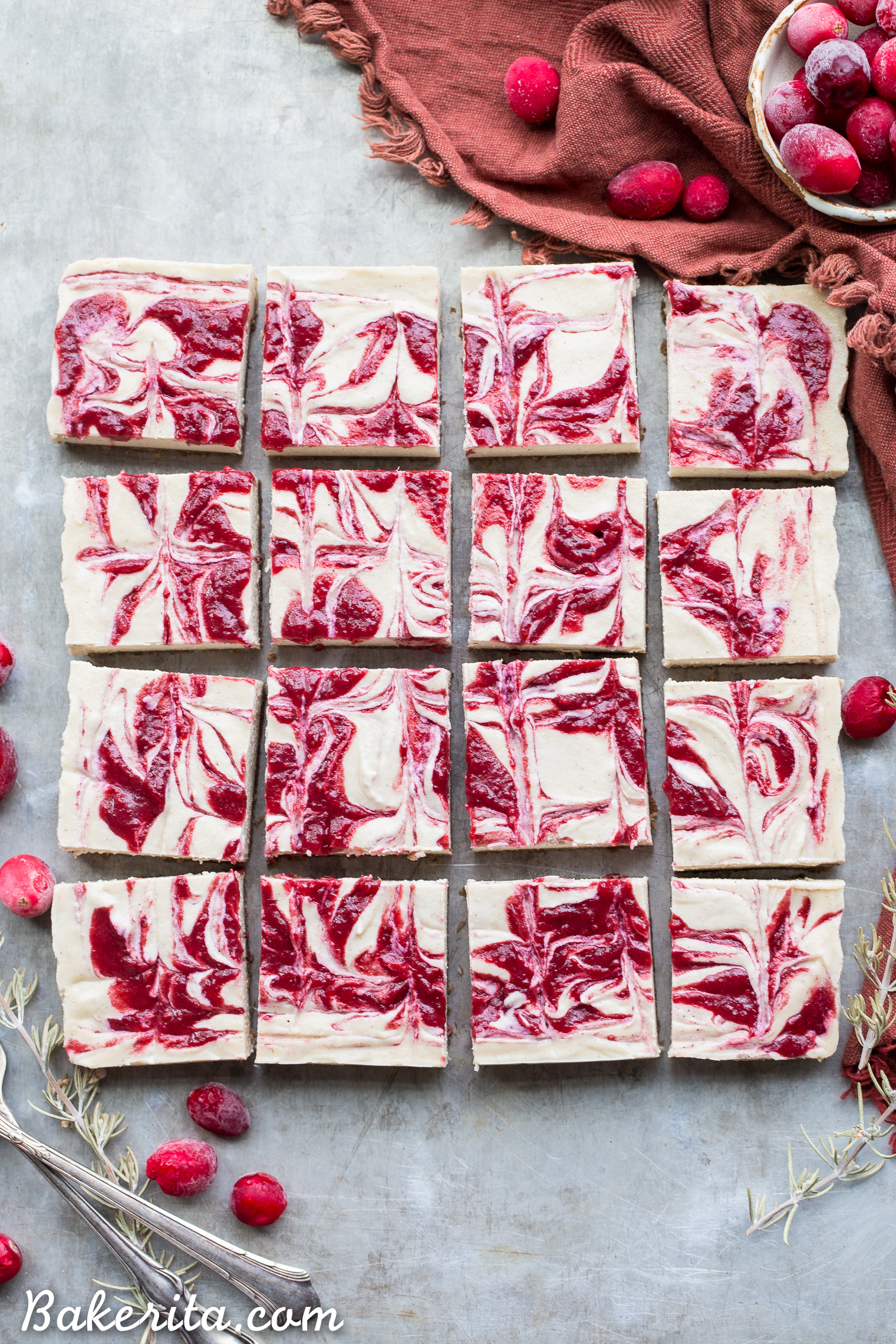 These No-Bake Vanilla Bean Cranberry Swirl Bars are made with cashews for a smooth and creamy "cheesecake" that's completely paleo, dairy free, vegan, and gluten free with no baking required! You can use leftover cranberry sauce for the tart cranberry swirl.