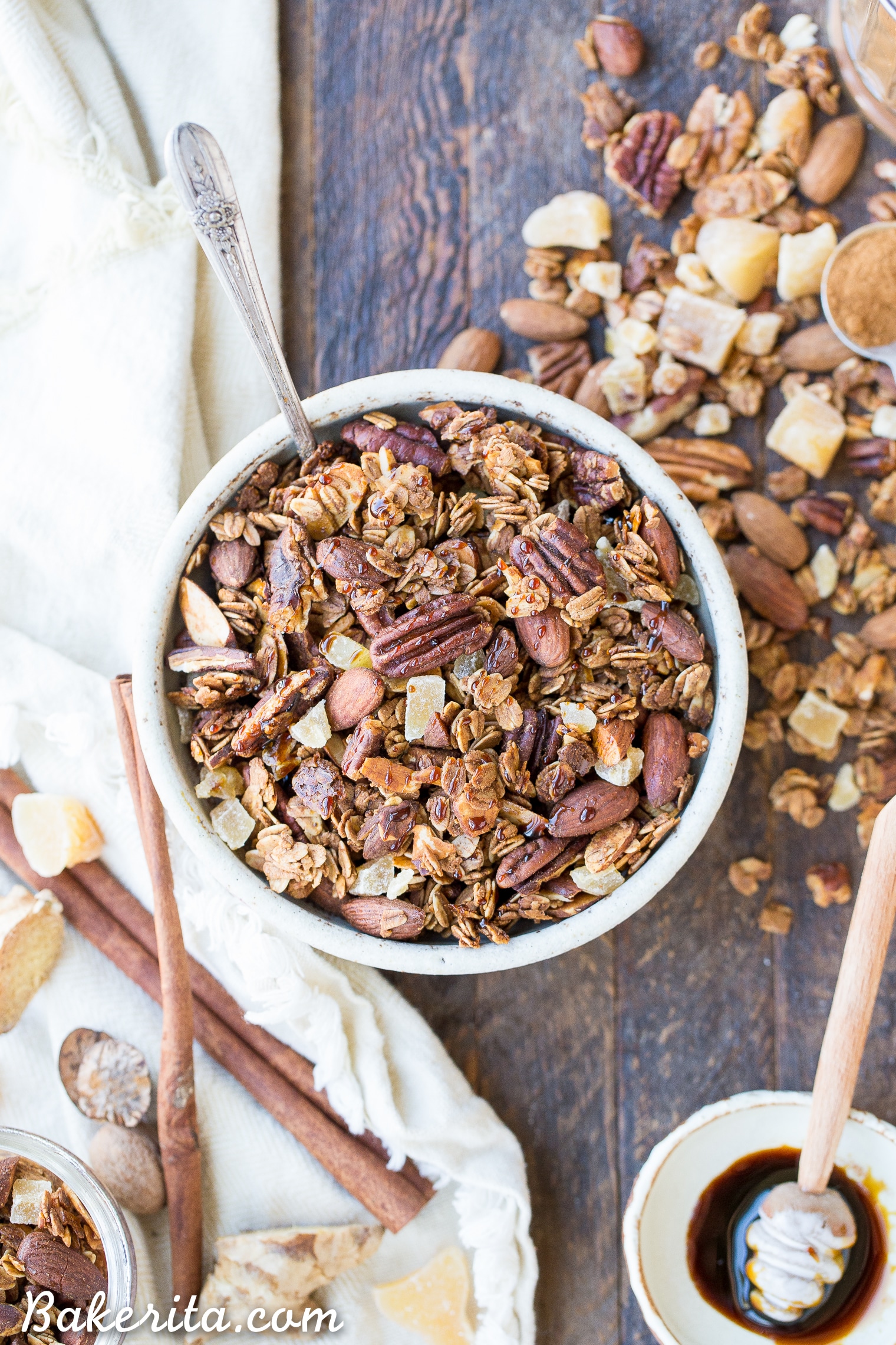 This Gingerbread Granola is crunchy & full of clusters, with loads of warm gingerbread spices, molasses, and bits of chewy crystallized ginger. This gluten-free and vegan breakfast is perfect for breakfast, or to package up in a cute jar and gift as a gift!