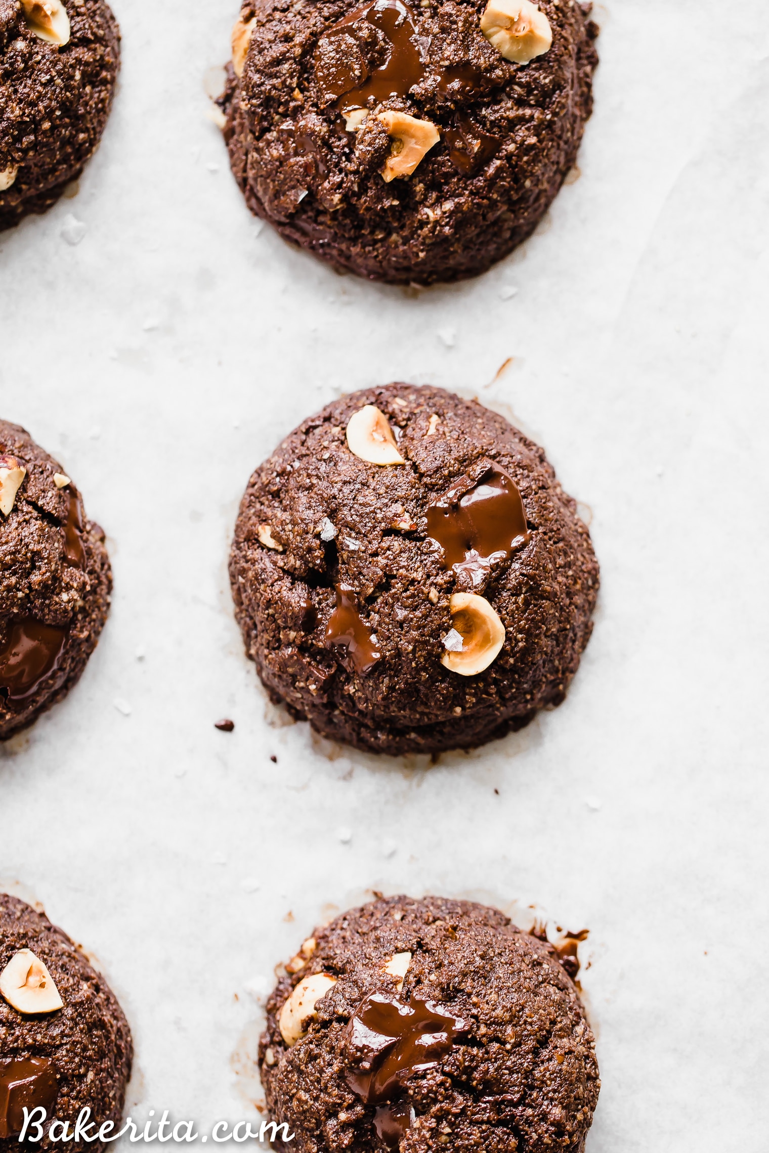 These Double Chocolate Hazelnut Cookies are soft, fudgy, and incredibly chocolatey! These irresistible cookies are loaded with melty dark chocolate chunks and crunchy hazelnuts, and you'd never guess they're gluten-free, paleo, and vegan. 
