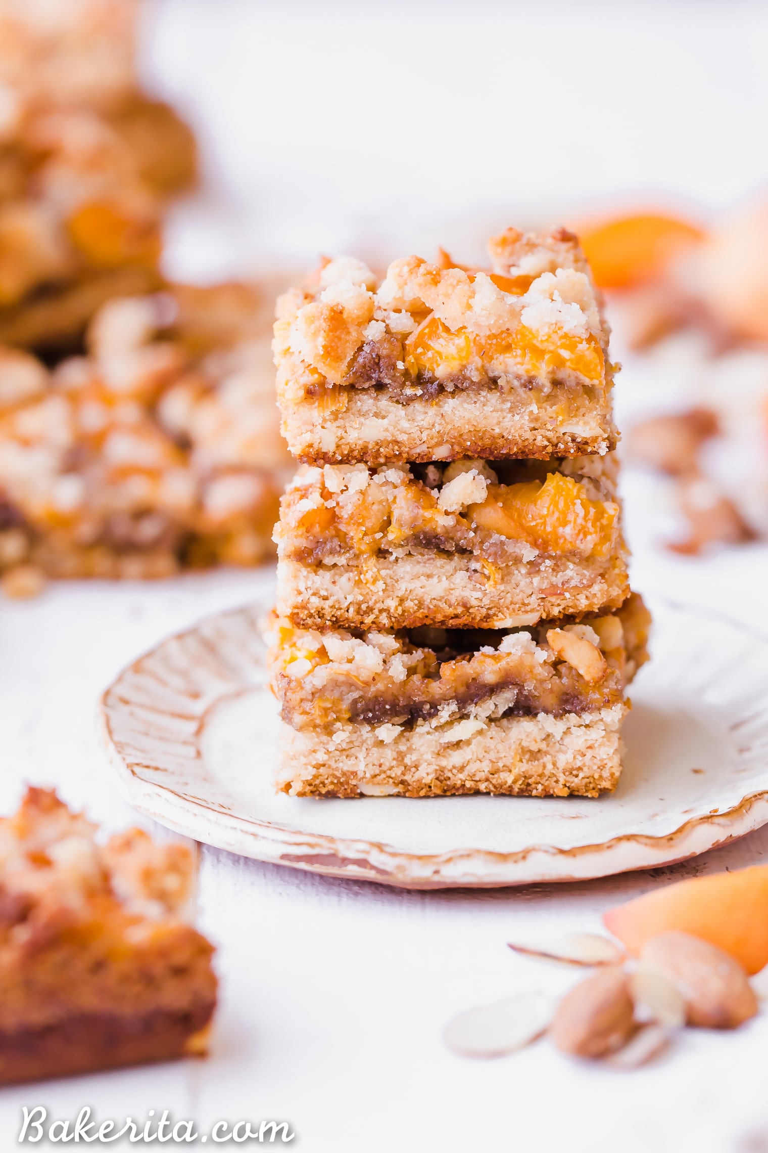 In these Apricot Frangipane Bars, apricots and almonds come together in the most delightful way - the shortbread crust is topped with an almond frangipane filling and topped with fresh, juicy apricots. These gluten-free, paleo, and vegan bars are irresistibly delicious. You can customize them with your favorite stone fruit, too!