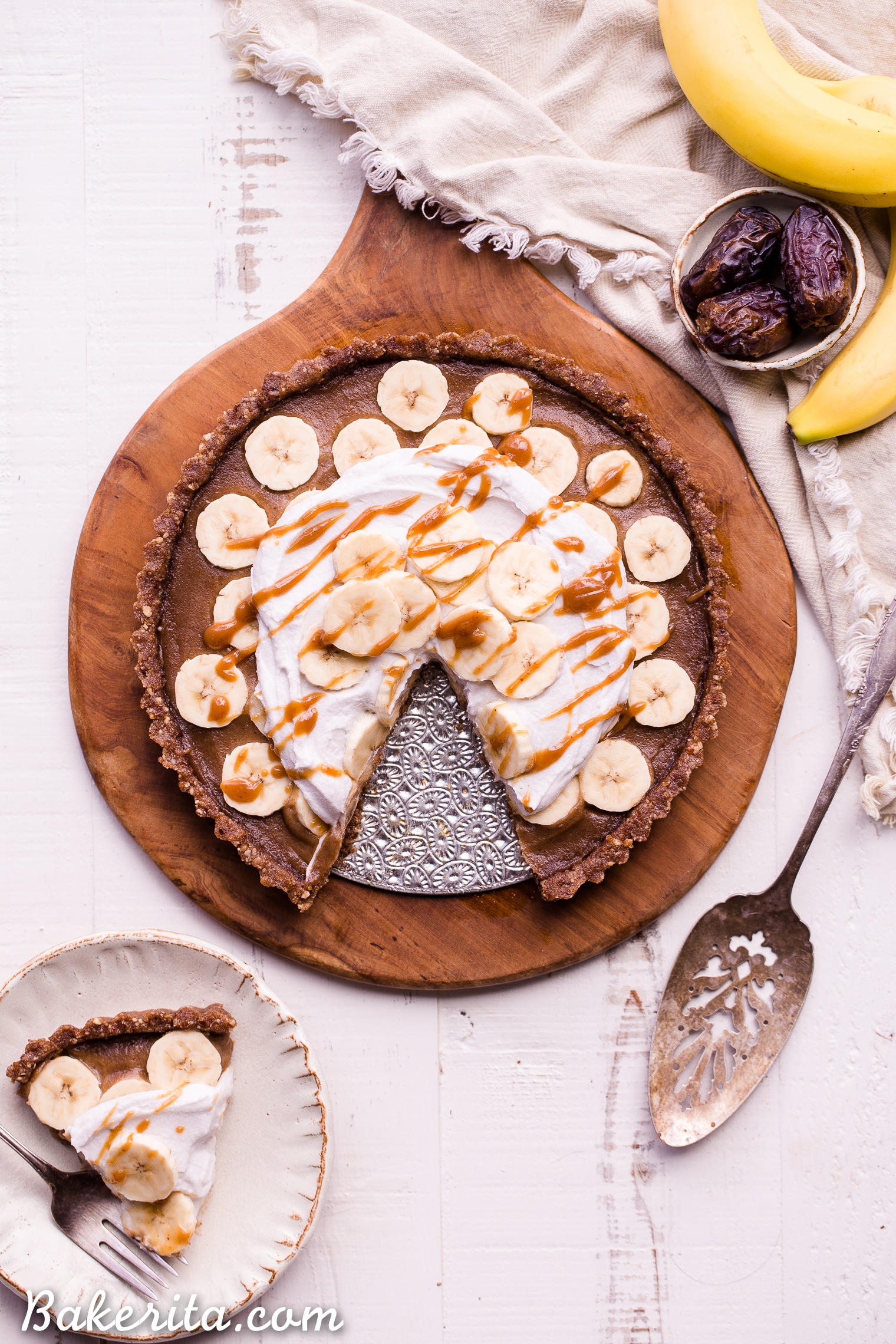 This No Bake Banana Caramel Tart is similar to a classic Banoffee pie, but there's no baking necessary and it's sweetened entirely with dates! This healthy twist on a classic is sweet and scrumptious with a date caramel filling and coconut whipped cream on top. It's gluten-free, paleo, and vegan.