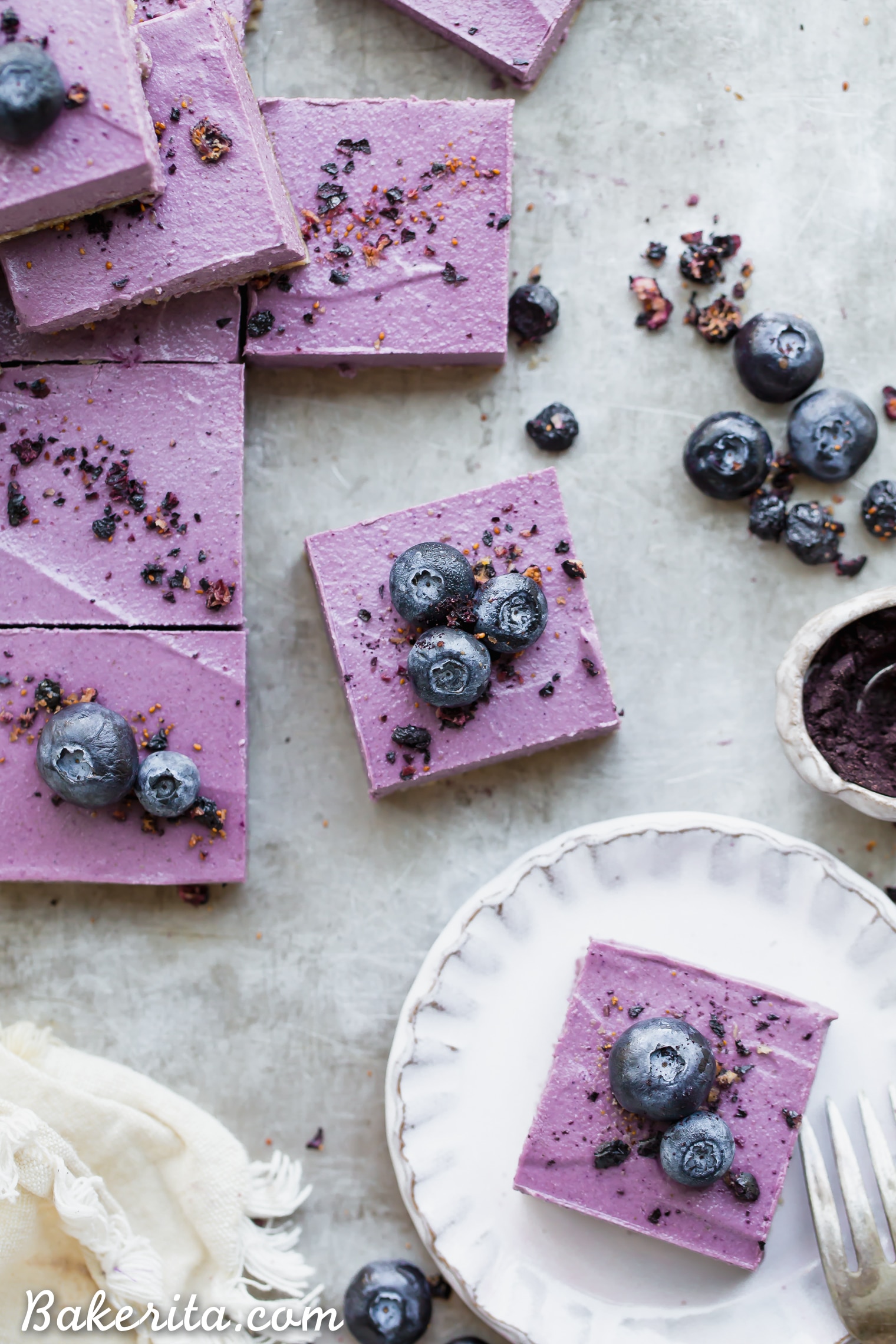 These creamy No-Bake Acai Maqui Berry Bars are full of antioxidants from acai + maqui berry powder - it's a punch of superfood power packed into a healthy and delicious dessert bar! These gluten-free, paleo and vegan bars are so refreshing - no baking necessary.