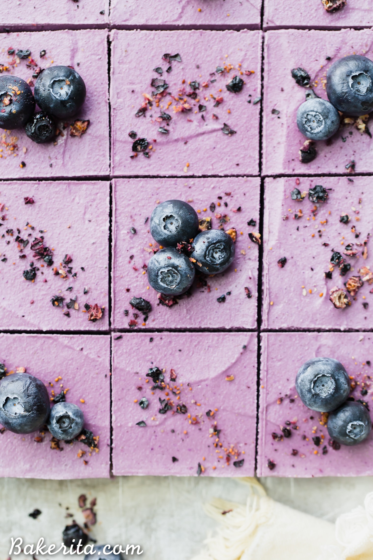 These creamy No-Bake Acai Maqui Berry Bars are full of antioxidants from acai + maqui berry powder - it's a punch of superfood power packed into a healthy and delicious dessert bar! These gluten-free, paleo and vegan bars are so refreshing - no baking necessary.