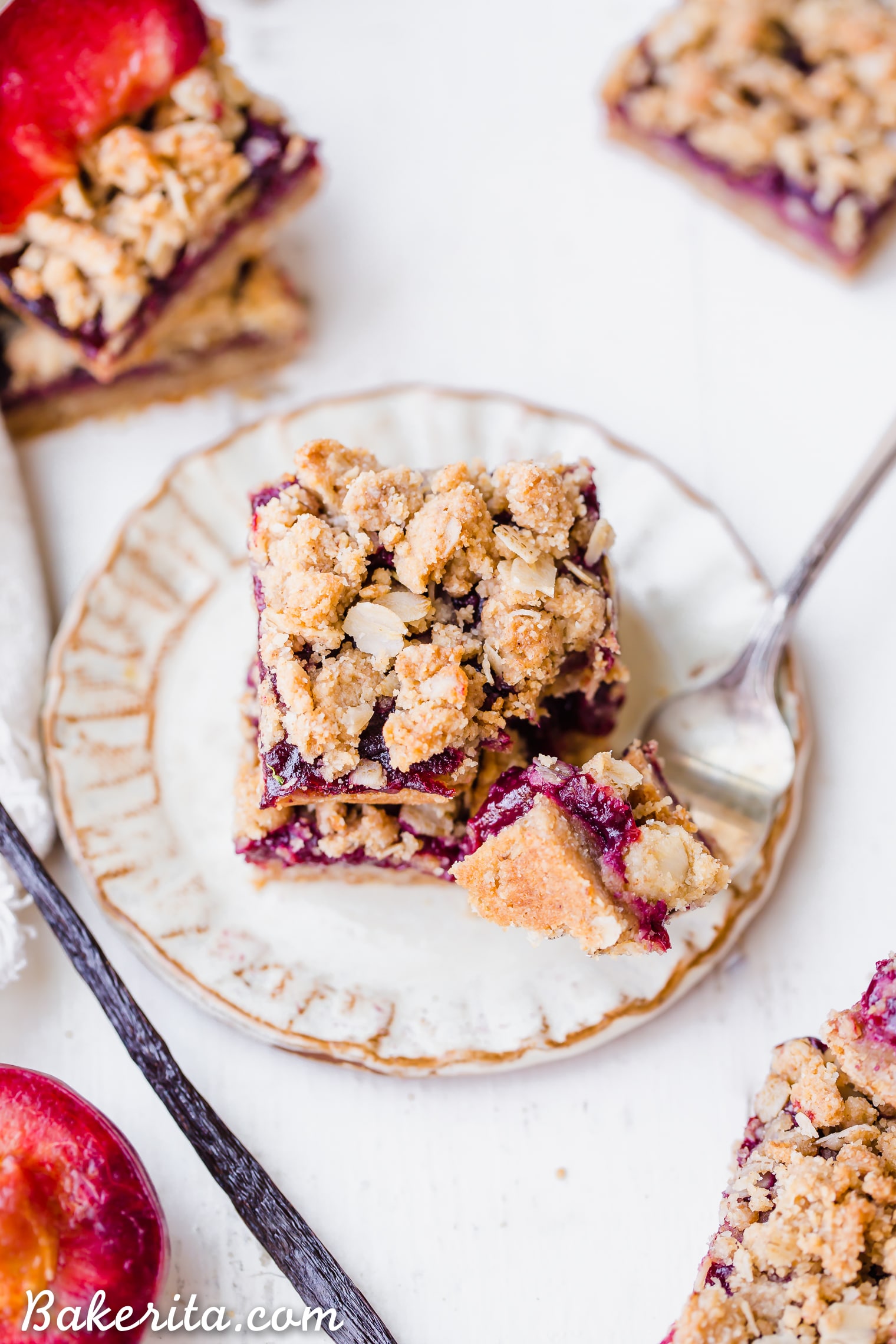 These Plum Crumble Bars have a delicious oatmeal crust and crumble topping that's filled with a simple plum jam. These simple bars highlight one of the summer's best stone fruits in a delicious gluten-free and vegan dessert.
